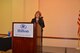 Jo Anne Dimitriou, AFSVA executive director, addresses the Air Force Youth of the Year winners during the Air Force Youth of the Year ceremony. (U.S. Air Force photo by Steve Warns / Released)