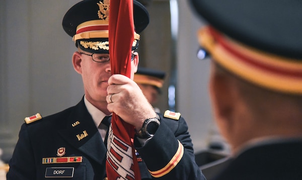 Col. Aaron L. Dorf, Portland District incoming commander, holds the District’s colors during a change of command ceremony, July 28 at the Sentinel Hotel, Portland. Dorf was most recently a student at the National Security Program at the Canadian Forces College in Toronto, Canada.