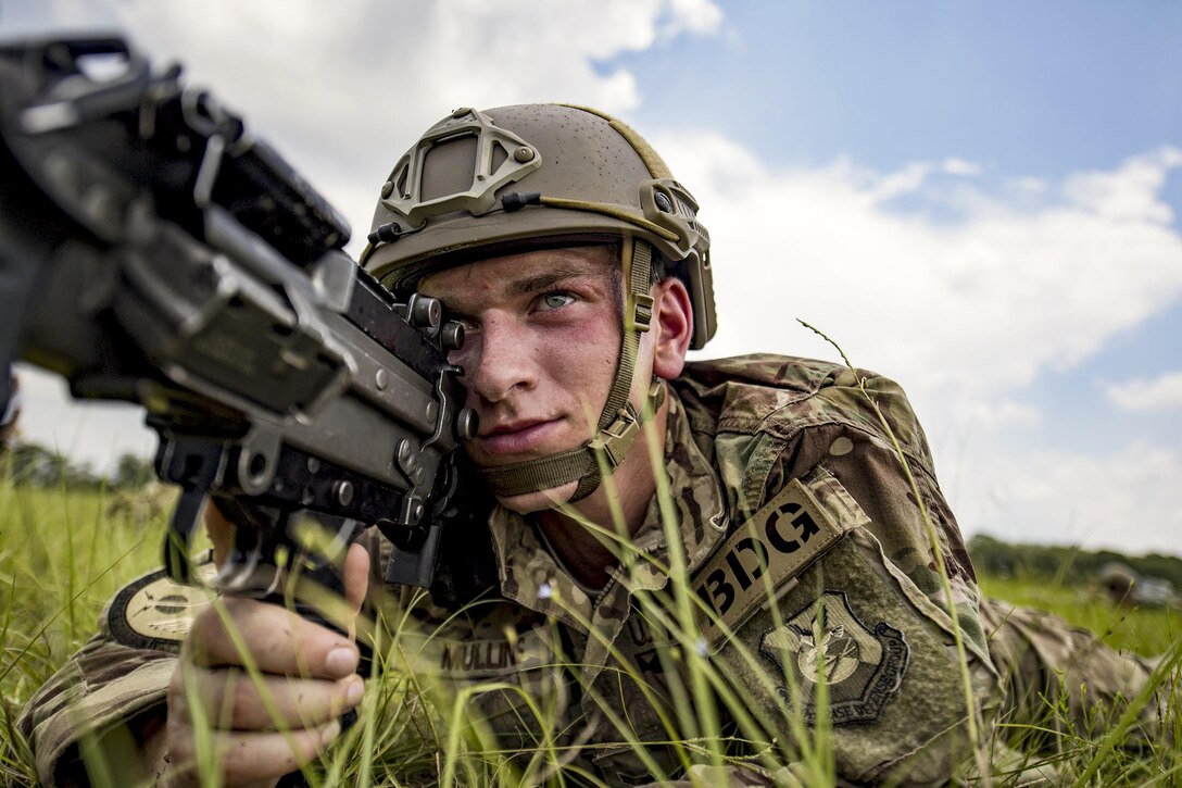 Airman 1st Class Sean Mullins secures a perimeter during training at the Lee Fulp Drop Zone in Tifton, Ga., July 21, 2017. Mullins is a fire team member assigned to the 823rd Base Defense Squadron. Air Force photo by Airman 1st Class Daniel Snider
