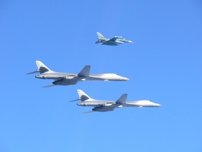 Two U.S. Air Force B-1B Lancers assigned to the 9th Expeditionary Bomb Squadron, deployed from Dyess Air Force Base, Texas, fly a 10-hour mission from Andersen Air Force Base, Guam, into Japanese airspace and over the Korean Peninsula, July 30, 2017. The B-1s first made contact with Japan Air Self-Defense Force F-2 fighter jets in Japanese airspace, then proceeded over the Korean Peninsula and were joined by South Korean F-15 fighter jets. U.S. Pacific Command maintains flexible bomber and fighter capabilities in the Indo-Asia-Pacific theater, retaining the ability to quickly respond to any regional threat in order to defend the U.S. homeland and in support of our allies. (Courtesy photo)