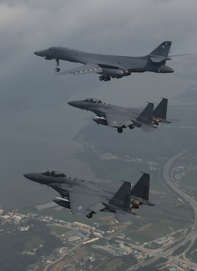 In a demonstration of ironclad U.S. commitment to our allies, a U.S. Air Force B-1B Lancer assigned to the 9th Expeditionary Bomb Squadron, deployed from Dyess Air Force Base, Texas, is joined by Republic of Korea air force F-15s during a 10-hour mission from Andersen Air Force Base, Guam, into Japanese airspace and over the Korean Peninsula, July 30, 2017. The B-1s first made contact with Japan Air Self-Defense Force F-2 fighter jets in Japanese airspace, then proceeded over the Korean Peninsula and were joined by South Korean F-15 fighter jets. This mission is in direct response to North Korea’s escalatory launch of intercontinental ballistic missiles on July 3 and 28. (Courtesy photo)