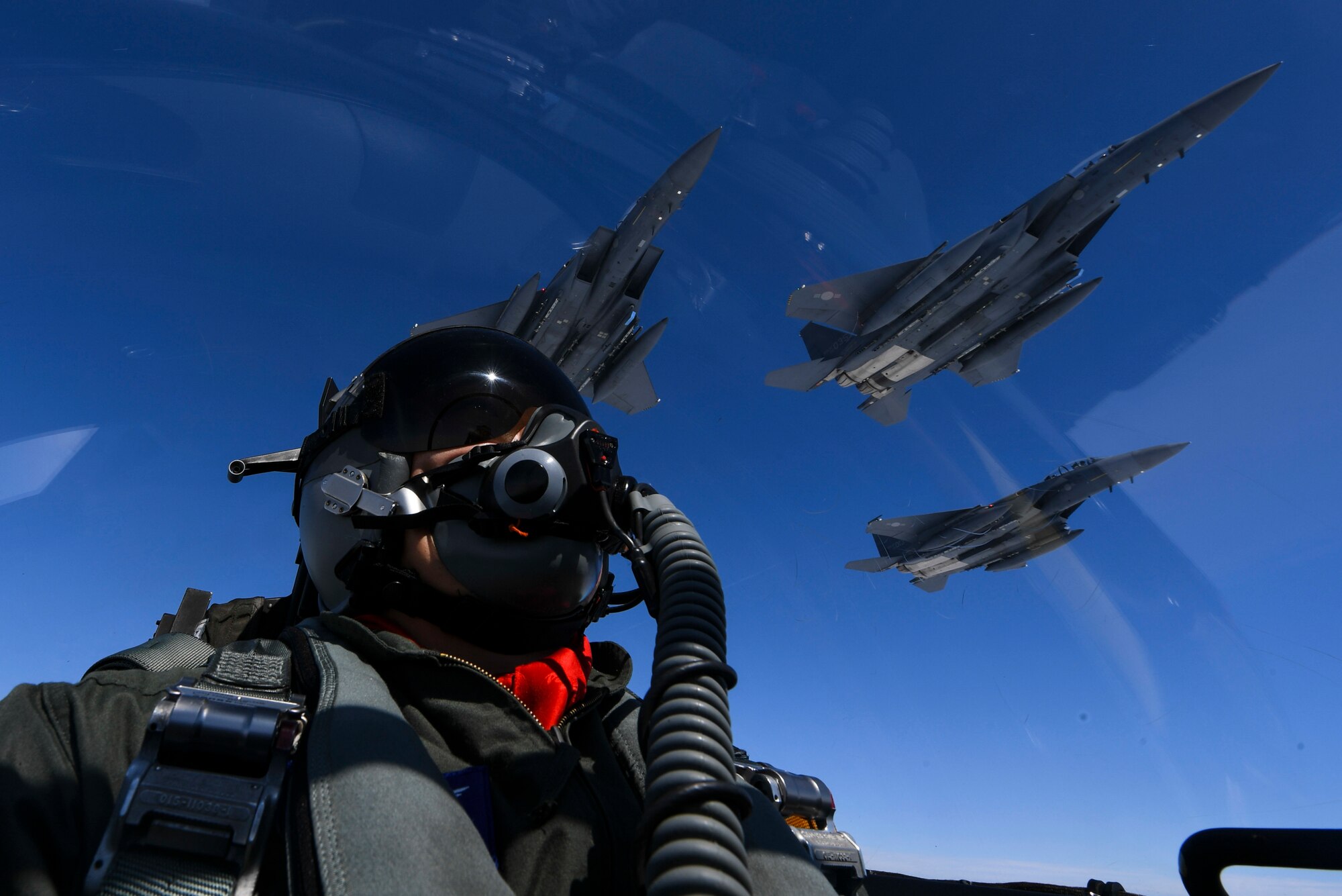 Two U.S. Air Force B-1B Lancers pass over a Republic of Korea air force F-15 during a 10-hour mission from Andersen Air Force Base, Guam, into Japanese airspace and over the Korean Peninsula, July 30, 2017. The B-1s first made contact with Japan Air Self-Defense Force F-2 fighter jets in Japanese airspace, then proceeded over the Korean Peninsula and were joined by South Korean F-15 fighter jets. This mission is part of the continuing demonstration of ironclad U.S. commitment to our allies.  (Courtesy photo)