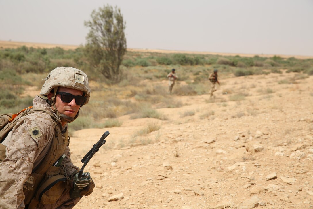 U.S. Marine Corps Gunnery Sgt. Ryan Kirkham, the combined anti-armor team platoon sergeant attached to Task Force Al Asad with 1st Battalion, 7th Marine Regiment, Special Purpose Marine Air-Ground Task Force-Crisis Response-Central Command, observes soldiers of the 7th Iraqi Infantry Division during training at Al Asad Air Base, Iraq, July 7, 2017. These Marines are part of the Task Force’s coalition security force team in charge of providing security to the base and personnel onboard. Task Force Al Asad’s mission is to advise and assist and build partner capacity with  the Iraqi Security Forces in Al Anbar province in support of Combined Joint Task Force-Operation Inherent Resolve, the global coalition to defeat ISIS in Iraq and Syria. (U.S. Marine Corps photo by 1st Lt. Dave Williams)