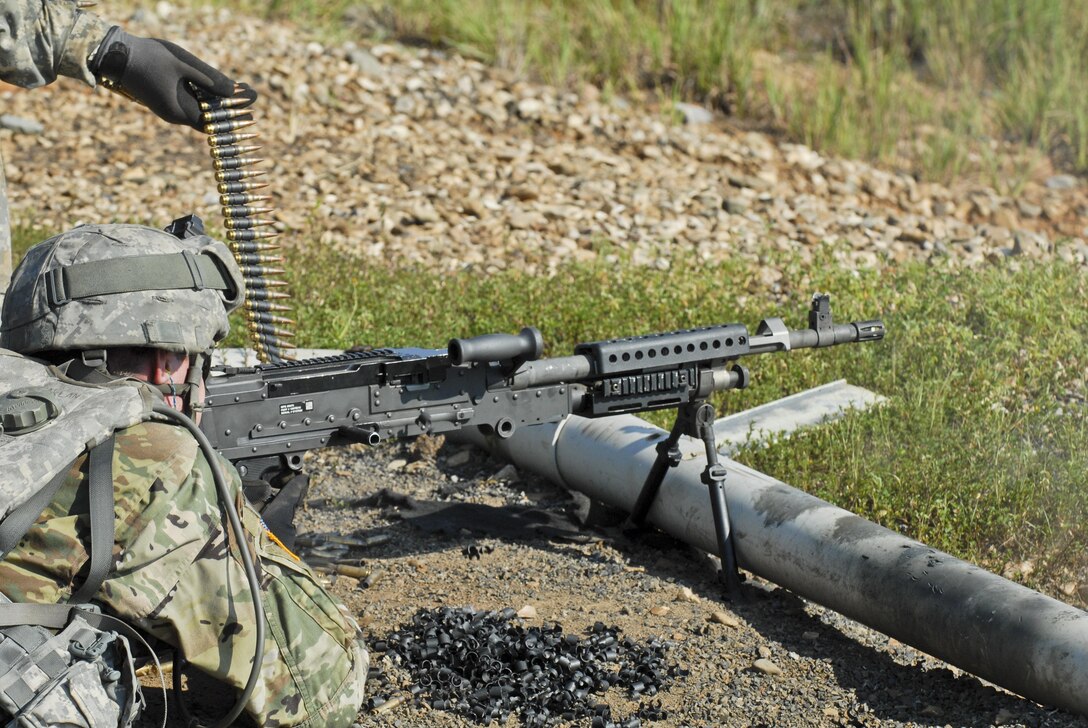 U.S. Army Reserve Soldiers with the 463rd FSC, Engineer Battalion, 411th Engineer Brigade and the 844th HHC, Engineer Battalion, 926th Engineer Brigade, 412th Theater Engineer Command, familiarize with and qualify fire the M240 machine gun and M249 Squad Automatic Weapon during River Assault 2017 at Fort Chaffee Maneuver Center, Ark., July 25, 2017. River Assault 2017 is a two-week extended combat training exercise held July 15-28 focusing on technical skills, of various service members, culminating with the construction of a floating improved ribbon bridge across the Arkansas River.  (U.S. Army Reserve Photo by Staff Sgt. Roger Ashley)