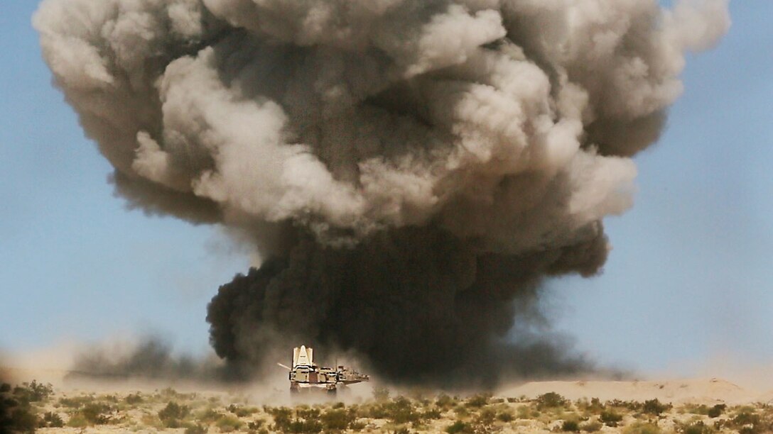 U.S. Marines with 2nd Combat Engineer Battalion, Marine Air Ground Task Force-8 (MAGTF-8) fire a mine clearing line charge (MCLIC) for a Tank Mechanized Assault Course (TMAC) during Integrated Training Exercise (ITX) 5-17 at Marine Corps Air Ground Combat Center, Twentynine Palms, Calif., July 28, 2017. The purpose of ITX is to create a challenging, realistic training environment that produces combat-ready forces capable of operating as an integrated MAGTF. (U.S. Marine Corps Photo by Sgt. Kassie L. McDole)
