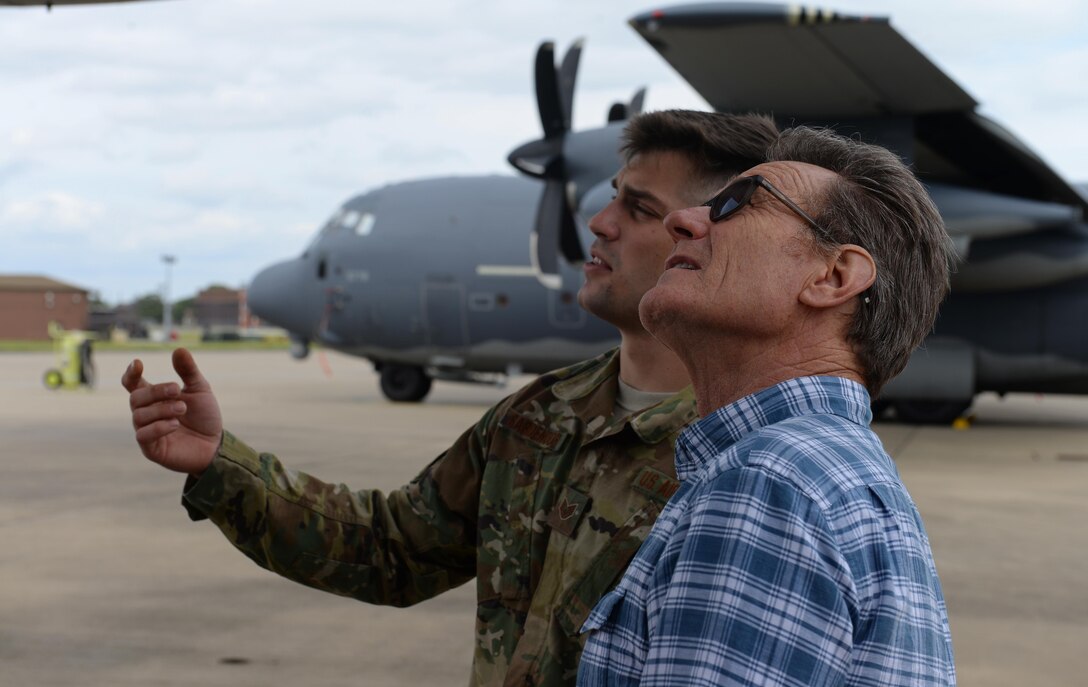 A U.S. Air Commando from the 352nd Special Operations Maintenance Group gives actor Bryan Cranston a tour of an MC-130 J Command II, July 29, 2017, during a United Service Organization Tour on RAF Mildenhall, England. Cranston is an award-winning actor known for his roles in popular television shows ‘Breaking Bad’ and ‘Malcom in the Middle,’ along with movies such as ‘Godzilla’ (2014) and ‘Trumbo’. (U.S. Air Force photo by Staff Sgt. Micaiah Anthony)