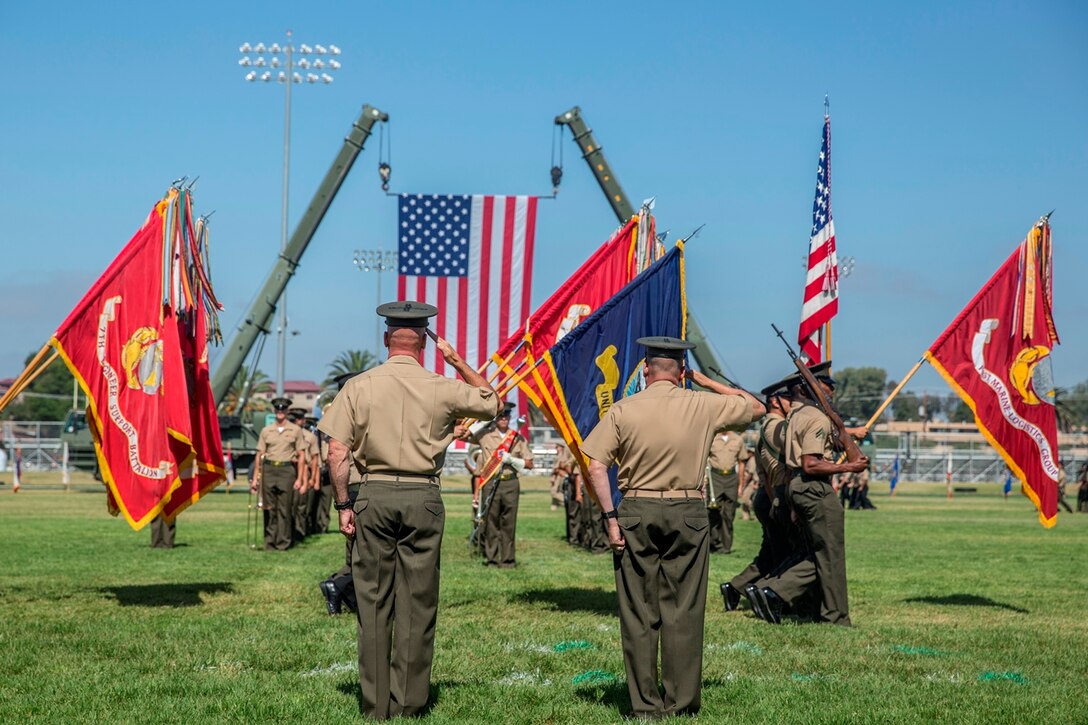 CAMP PENDLETON, Calif. - U.S. Marine Brig. Gens. David A. Ottignon and Stephen D. Sklenka render salutes during the pass in review portion of the 1st MLG change of command ceremony at Camp Pendleton, July 28, 2017. Ottignon is scheduled to report to Headquarters Marine Corps in the Nation Capitol Region. Sklenka was previously the Principal Director to the Deputy Assistant Secretary of Defense for South and Southeast Asian in Office of the Under Secretary of Defense for Policy. (U.S. Marine Corps photo by Sgt. Alvin Pujols)
