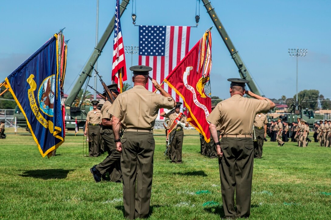 CAMP PENDLETON, Calif. - U.S. Marine Brig. Gens. David A. Ottignon and Stephen D. Sklenka render salutes during the pass in review portion of the 1st MLG change of command ceremony at Camp Pendleton, July 28, 2017. Ottignon is scheduled to report to Headquarters Marine Corps in the Nation Capitol Region. Sklenka was previously the Principal Director to the Deputy Assistant Secretary of Defense for South and Southeast Asian in Office of the Under Secretary of Defense for Policy. (U.S. Marine Corps photo by Sgt. Alvin Pujols)