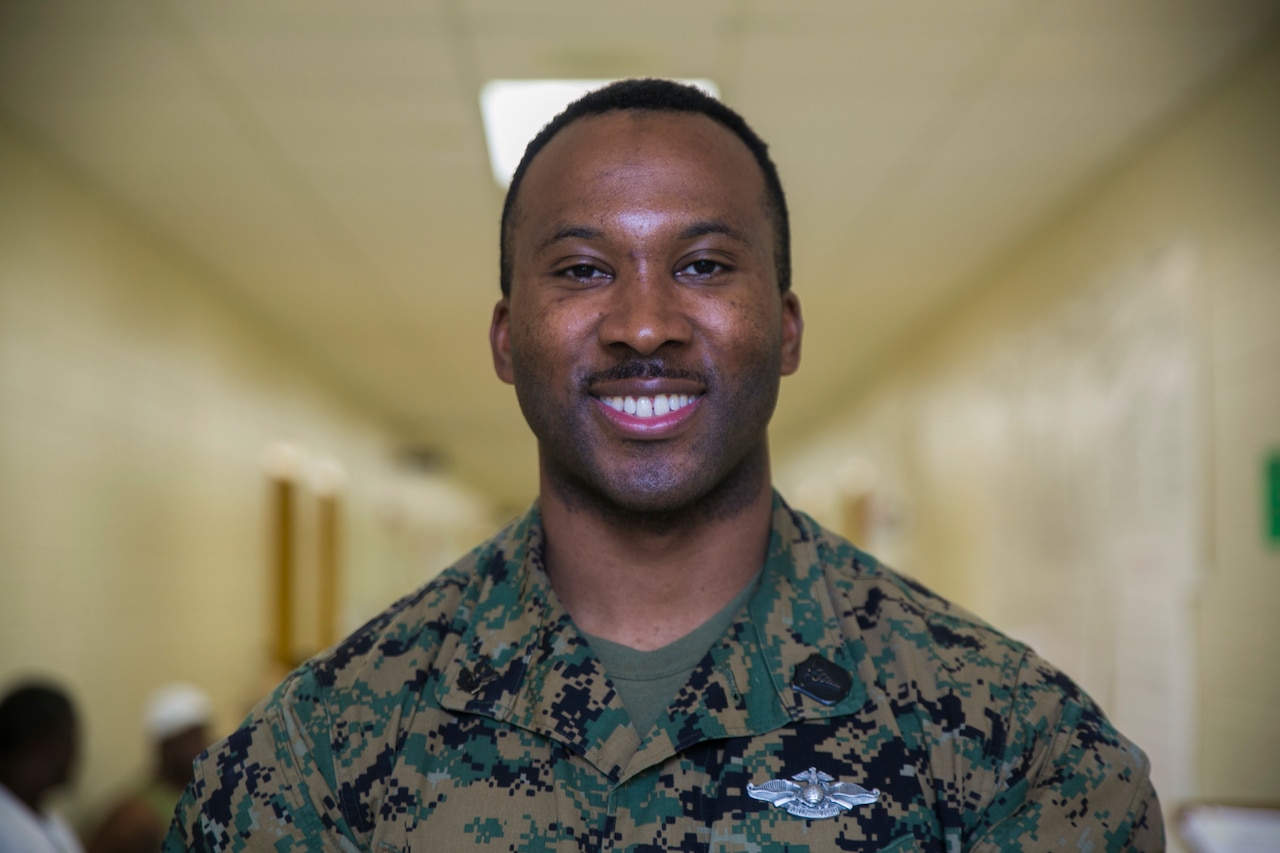 Navy Petty Officer 2nd Class Necorian Jones, a dental corpsman with 4th Dental Battalion, 4th Marine Logistics Group, Marine Forces Reserve, also a high school teacher and football coach in Texas, poses for a photo during preparations for Louisiana Care 2017 in Reserve, La., July 12, 2017. Marine Corps photo by Pvt. Samantha Schwoch