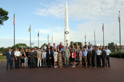 U.S. Strategic Command (USSTRATCOM) “Experience Day” participants are greeted by U.S. Air Force Gen. John E. Hyten, commander of USSTRATCOM, during a command visit at Offutt Air Force Base, Neb., July 28, 2017.   International, military, governmental, academic and industry experts who attended the 2017 USSTRATCOM Deterrence Symposium were invited to the half-day event. More than 50 individuals were given a USSTRATCOM mission brief, toured the Global Operations Center and visited a B-52 Stratofortress, OC-135 Observation Aircraft, E-6B Mercury and a Terminal High Altitude Area Defense launcher. 