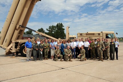 U.S. Strategic Command (USSTRATCOM) “Experience Day” participants conclude their tour in front of a Terminal High Altitude Area Defense launcher on the flight line at Offutt Air Force Base, Neb., July 28, 2017.   International, military, governmental, academic and industry experts who attended the 2017 USSTRATCOM Deterrence Symposium were invited to the half-day event. More than 50 individuals were given a USSTRATCOM mission brief, toured the Global Operations Center and visited a B-52 Stratofortress, OC-135 Observation Aircraft, and an E-6B Mercury. 
