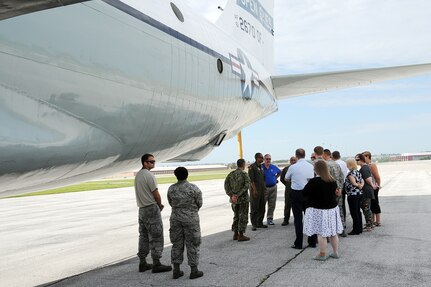 U.S. Strategic Command (USSTRATCOM) “Experience Day” participants learn about the OC-135 Open Skies observation aircraft at Offutt Air Force Base, Neb., July 28, 2017.   International, military, governmental, academic and industry experts who attended the 2017 USSTRATCOM Deterrence Symposium were invited to the half-day event. More than 50 individuals were given a USSTRATCOM mission brief, toured the Global Operations Center and visited a B-52 Stratofortress, E-6B Mercury and a Terminal High Altitude Area Defense launcher. 