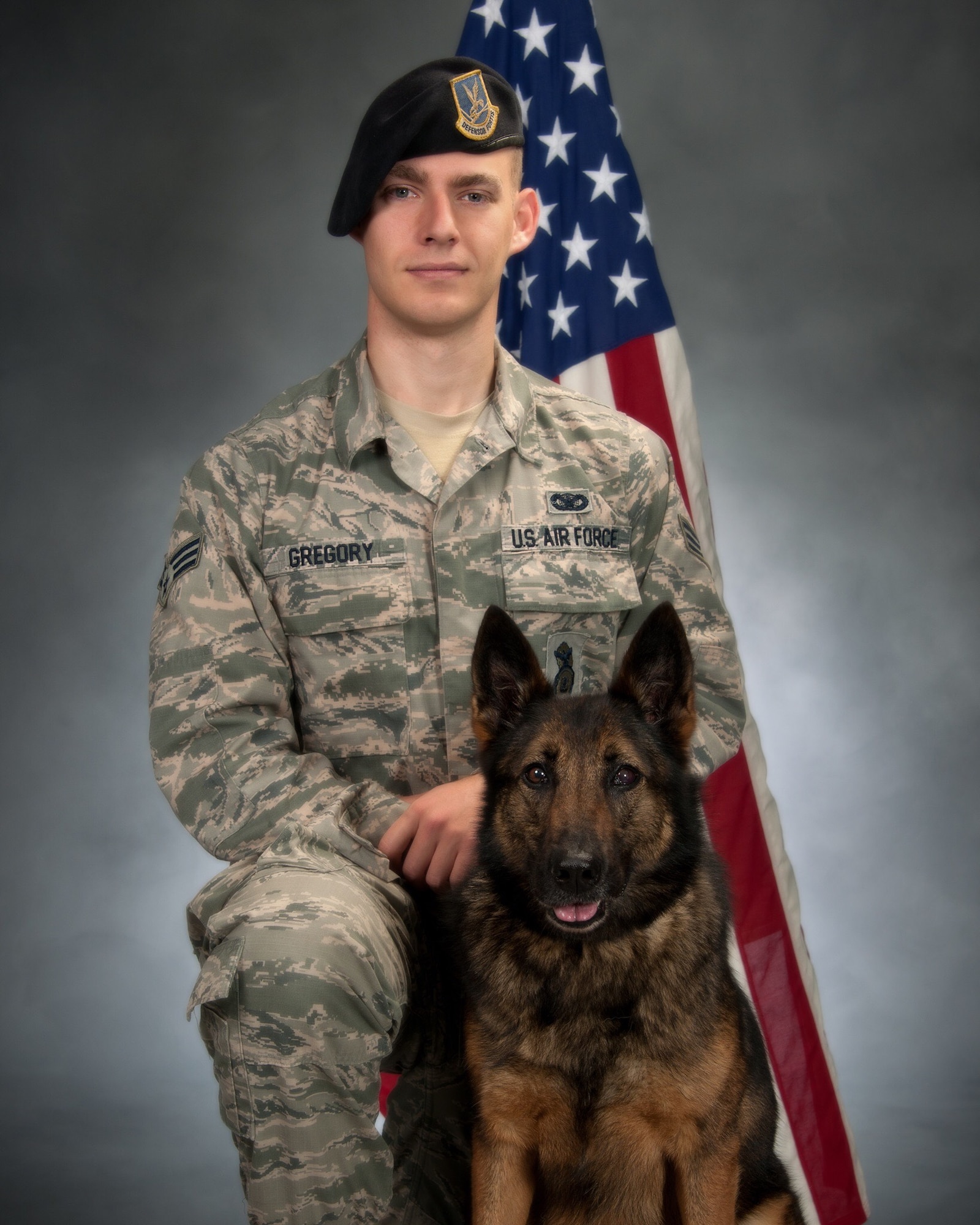 Senior Airman Clinton Gregory, 42nd Security Forces Squadron military working dog handler, with his MWD Elza at Maxwell Air Force Base, Ala. Elza succumbed to cancer in early July 2017 months before she was set to retire. (Courtesy photo)