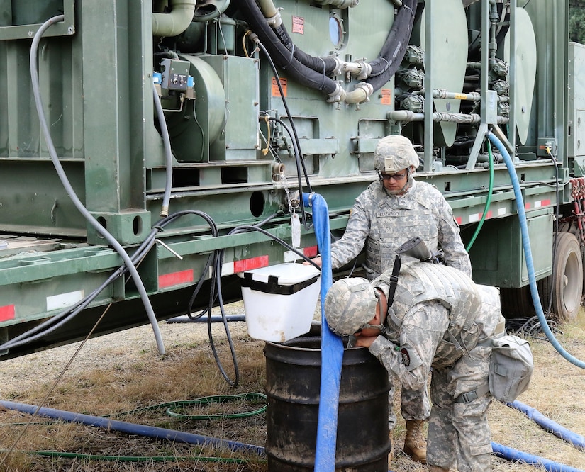 Soldiers from the U.S. Army Reserve 340th Quartermaster Company operate a Laundry Advanced System during the two-week 2017 Quartermaster Liquid Logistics Exercise at Joint Base Lewis McChord, WA, Jul. 14 to 27, 2017.  QLLEX allows U.S. Army Reserve units to demonstrate their skills and provide real-world fuel and water support while training at the tactical, operational, and strategic level.  (U.S. Army Reserve Photo by Maj. Brandon R. Mace)