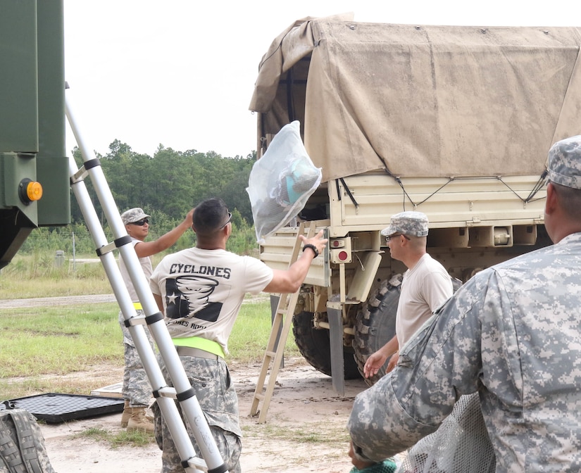 U.S. Army Reserve Soldiers from the U.S. Army Reserve 242nd Quartermaster Company provide laundry services during the two-week 2017 Quartermaster Liquid Logistics Exercise at Fort Stewart, GA, Jul. 14 to 27, 2017.  QLLEX allows U.S. Army Reserve units to demonstrate their skills and provide real-world fuel and water support while training at the tactical, operational, and strategic level.  (U.S. Army Reserve Photo by Maj. Brandon R. Mace)