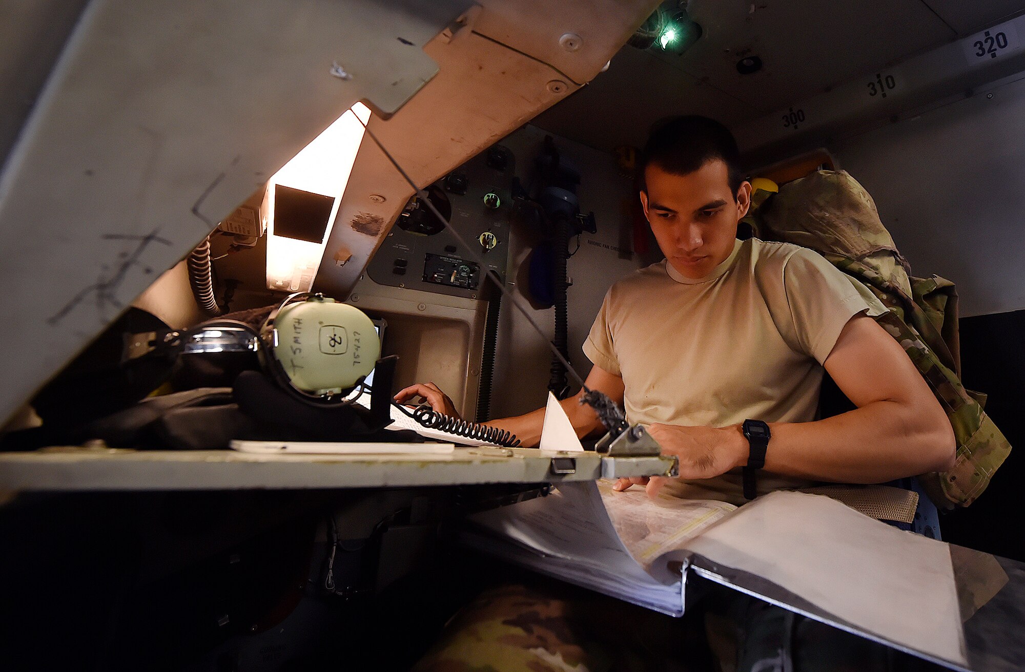 Senior Airman Raymond Salas, 15th Airlift Squadron C-17 Globemaster III loadmaster, conducts prelaunch checks for a C-17 here, prior to departing for Joint Base Lewis-McChord, Washington State, in support of Exercise Mobility Guardian July 31. Mobility Guardian is designed to enhance the capabilities of mobility Airmen to succeed in dynamic threat environments. The exercise features more than 3,000 participants and involves 25 countries from July 31 to Aug. 11. (U.S. Air Force photo by Staff Sgt. Christopher Hubenthal)