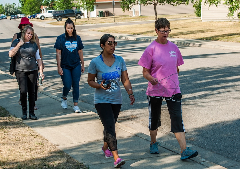Members of Team Minot participate in the Minot Monday Community Walks at Minot Air Force Base, N.D., July 23, 2017. These walks last from 45 minutes to an hour and are used to promote health and wellness in the base community. (U.S. Air Force photo by Airman 1st Class Jonathan McElderry)