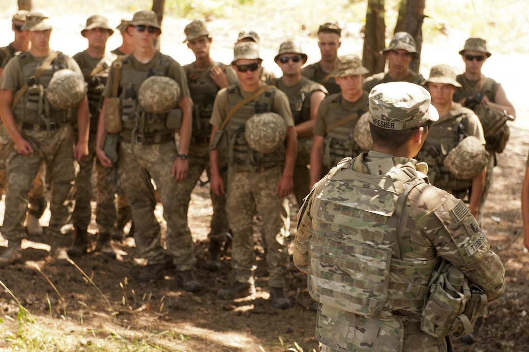 U.S. Army 2nd Lt. Chase Thresher conducts an after action review with soldiers assigned to the Ukraine’s 1st Battalion, 95th Separate Airmobile Brigade following rifle marksmanship training at the Yavoriv Combat Training Center in Yavoriv, Ukraine, July 31, 2017. Army photo by Staff Sgt. Eric McDonough



