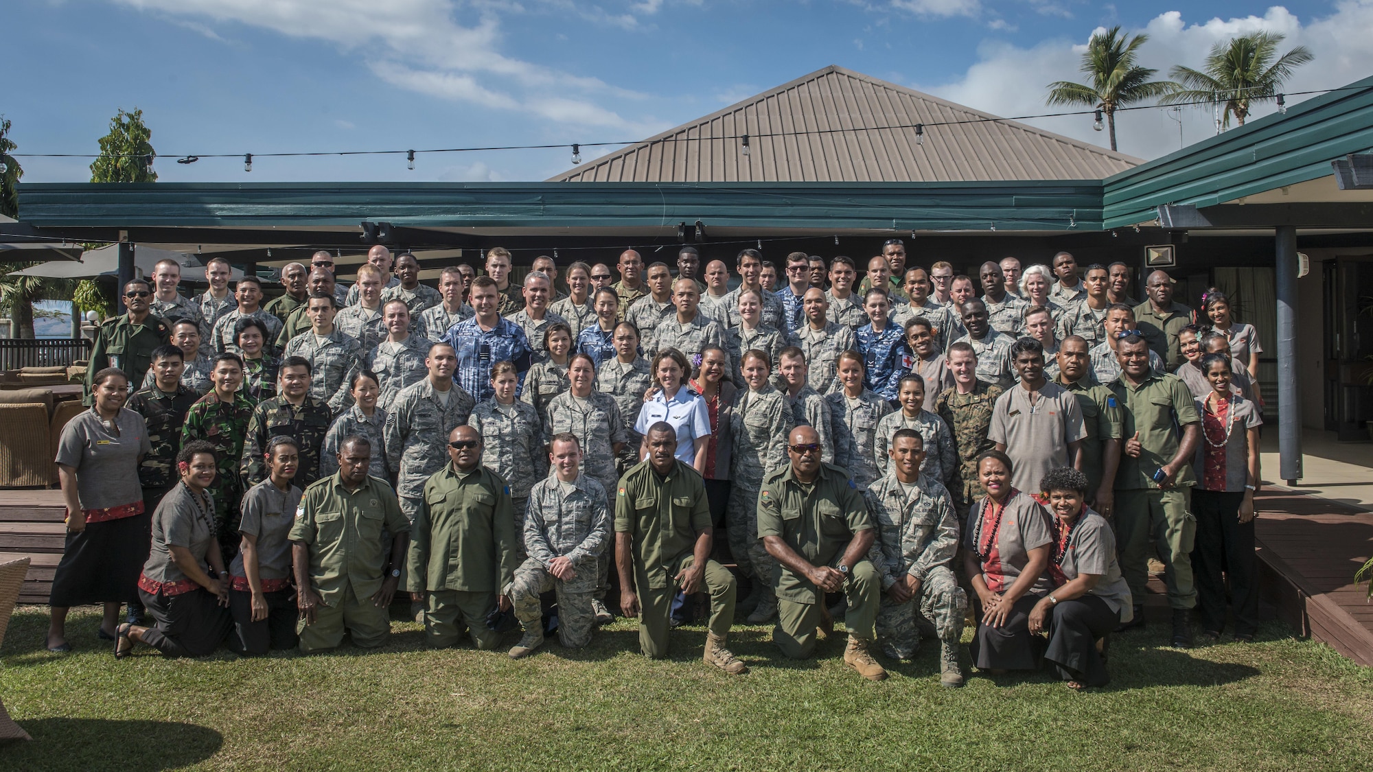 Members of the Pacific Angel 17-3 (PACANGEL) team pose for a photo in Lautoka, Fiji, July 24, 2017. The team consisted of service members from five partnering nations aside from the U.S. and Republic of Fiji including Australia, Vanuatu, Indonesia, the Philippines and France. The nations all offered their assistance in the exercise promoting regional military-civilian-nongovernmental organization cooperation and interoperability across the Indo-Asia-Pacific region. The hotel staff joined in the photo as their support for the service members staying at their hotel ensured the PACANGEL 17-3 personnel were well rested, fed and relaxed when caring for their fellow countrymen whether at the health services site or on engineering projects. (U.S. Air Force photo/Tech. Sgt. Benjamin W. Stratton)