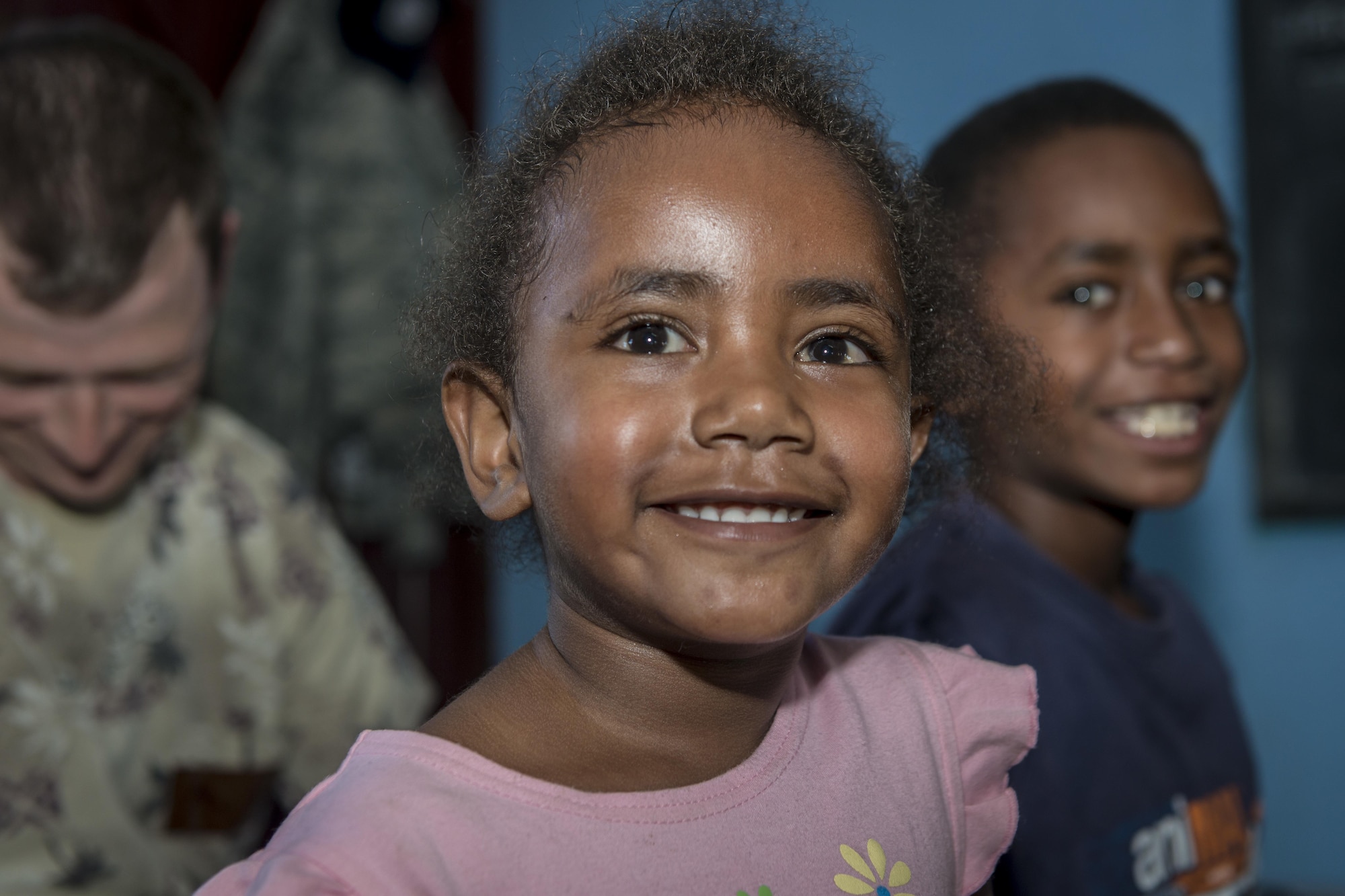 Children seeking medical care with the Pacific Angel (PACANGEL) 17-3 health services site at the Tagitagi Sangam School and Kindergarten in Tavua, Fiji, pose for a photo July 17, 2017. PACANGEL 17-3 built partnerships between the U.S., Fiji, and five regional nations including Australia, Vanuatu, Indonesia, the Philippines and France by conducting multilateral humanitarian assistance and civil military operations, promoting regional military-civilian-nongovernmental organization cooperation and interoperability. (U.S. Air Force photo/Tech. Sgt. Benjamin W. Stratton)