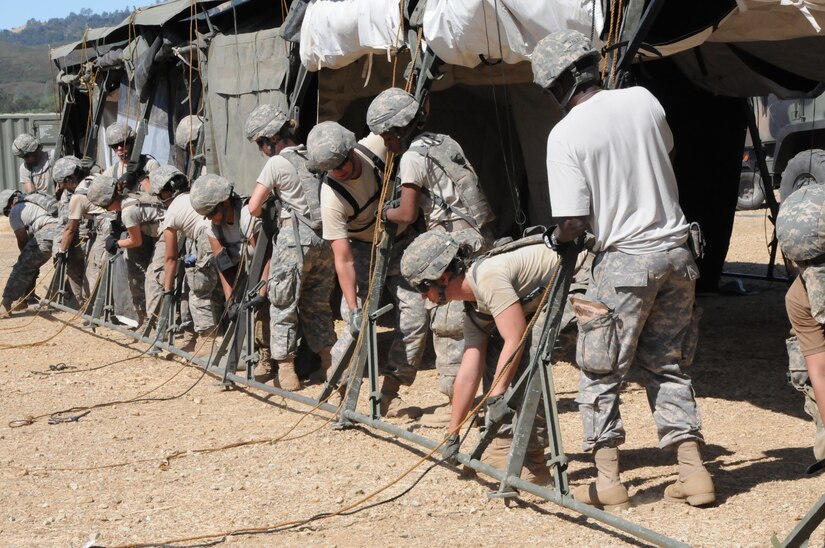 3rd Medical Command (Deployment Support)’s 345th Combat Support Hospital out of Jacksonville, Florida, commanded by Col. Noel Pace, is one of the training audiences participating in Global Medic 2017 at Fort Hunter Liggett, California.  The nearly 250 Soldiers assigned to the CSH spent the first few days setting up the hospital and getting it ready to begin receiving patients.  The exercise runs 8-28 July, 2017.
Global Medic’s unique training opportunity allows U.S. Army Reserve medical units to train alongside their multi-component and joint partners as part of the America’s Army Reserve evolution into the most lethal Federal Reserve force in the history of the nation.  The training audience for this year’s Global Medic exercise totaled more than 1,100 service members, ensuring individuals, teams and units are better prepared to provide medical care when they are called to deploy.