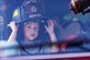 A little boy tries on a fire captain’s helmet during Big Truck Day July 28 in Destin, Fla.  A fire engine from the 96th Civil Engineer Group was on display while firefighters educated the public about fire safety. Fire, construction, garbage and utility trucks were also on display for kids to see up close during the city’s annual event. (U.S. Air Force photo/Kristin Stewart)