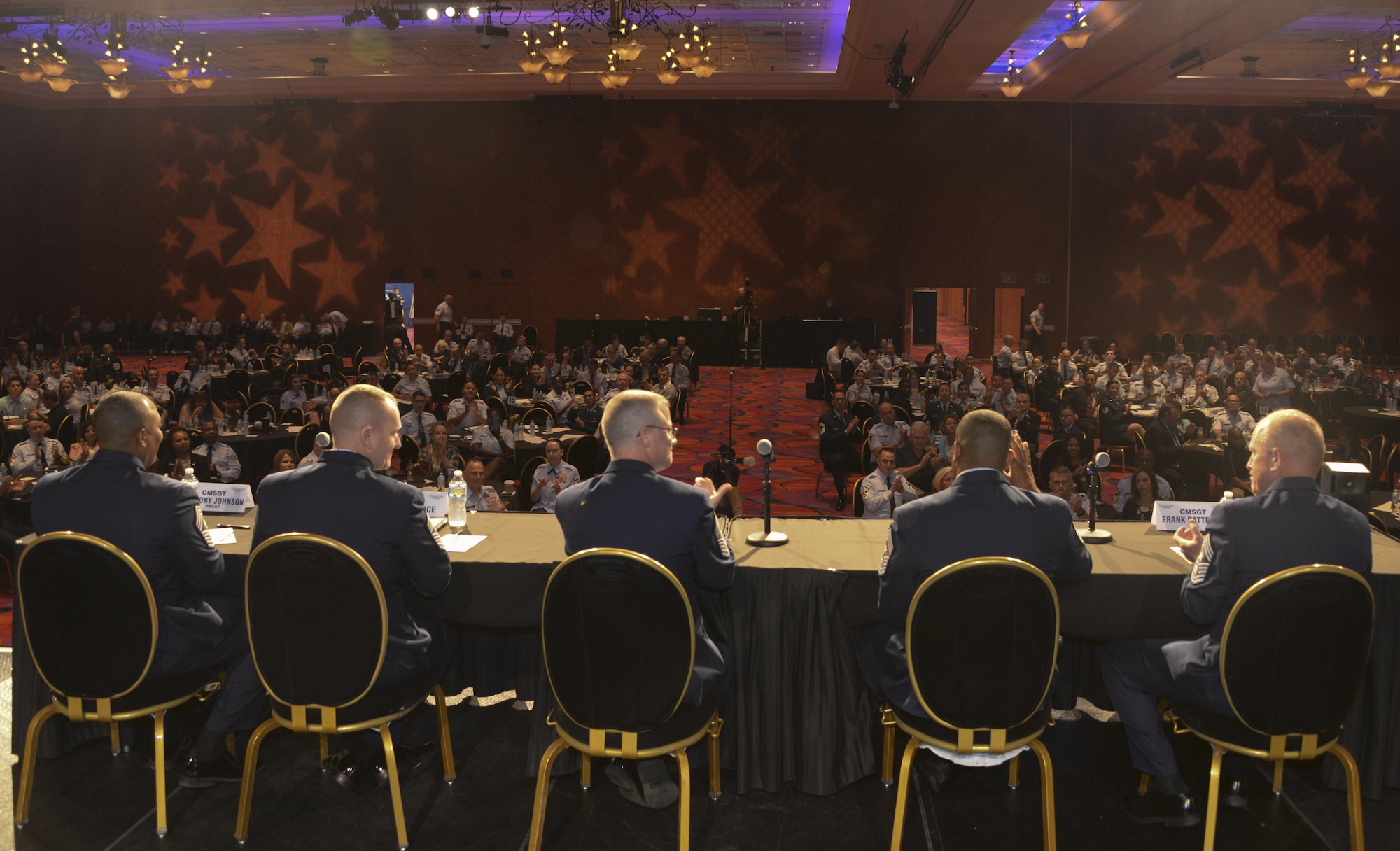 Command chief master sergeants from five major commmands speak at a professional development forum July 24 at the Air Force Sergeants Association International Convention in Reno, Nevada. Airmen were given the opportunity to learn from and speak directly to the panel consisting of enlisted leadership from Air Force Special Operations Command, Pacific Air Forces Command, Air Combat Command, Air Force Materiel Command and U.S. Air Forces in Europe Command. (U.S. Air Force photo by Senior Airman Amber Carter)