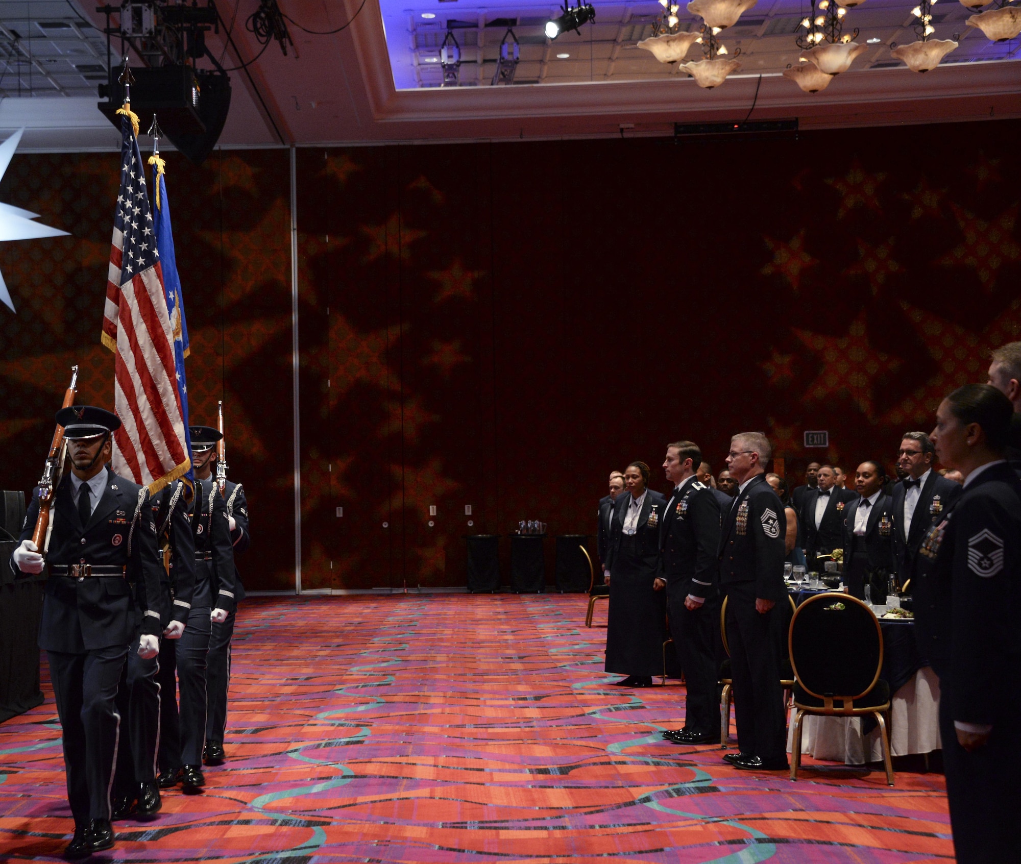 The Honor Guard from Travis Air Force Base, Calif., present the colors at the Air Force Sergeants Association International Convention in Reno, Nevada. This signified the beginning of the Air Force Honors Banquet, which was the final event for the Professional Airmen's Conference. (U.S. Air Force photo by Senior Airman Amber Carter)