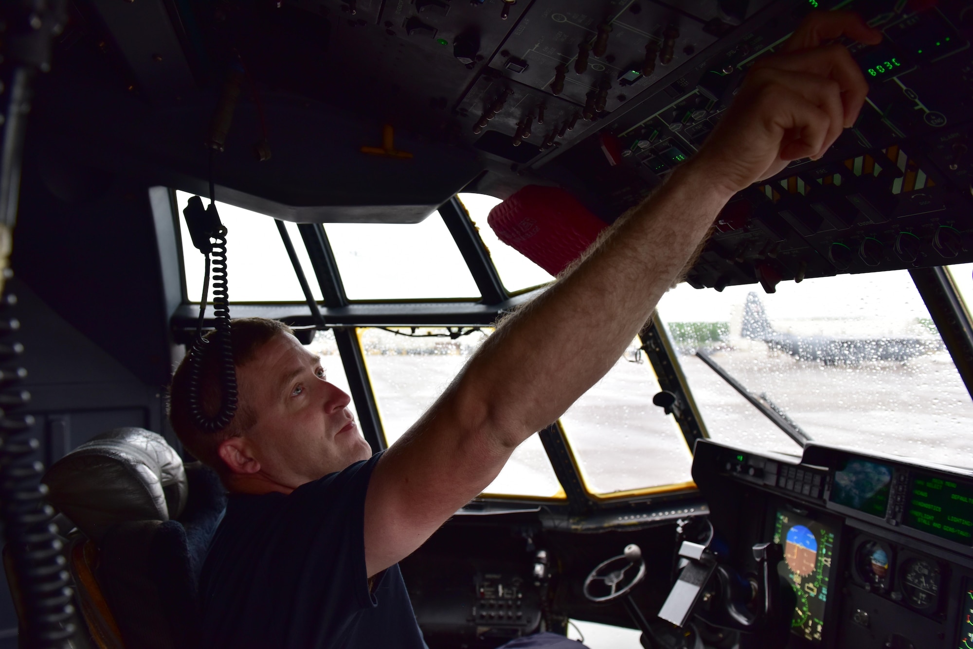 A DynCorp International contractor prepares a C-130J for flight April 17, 2017, at Little Rock Air Force Base, Ark. The 314th Maintenance Group completed a six-month transition from enlisted Airmen to DynCorp International contractors to sustain the C-130 training mission at Little Rock AFB. (U.S. Air Force photo by Senior Airman Mercedes Taylor)