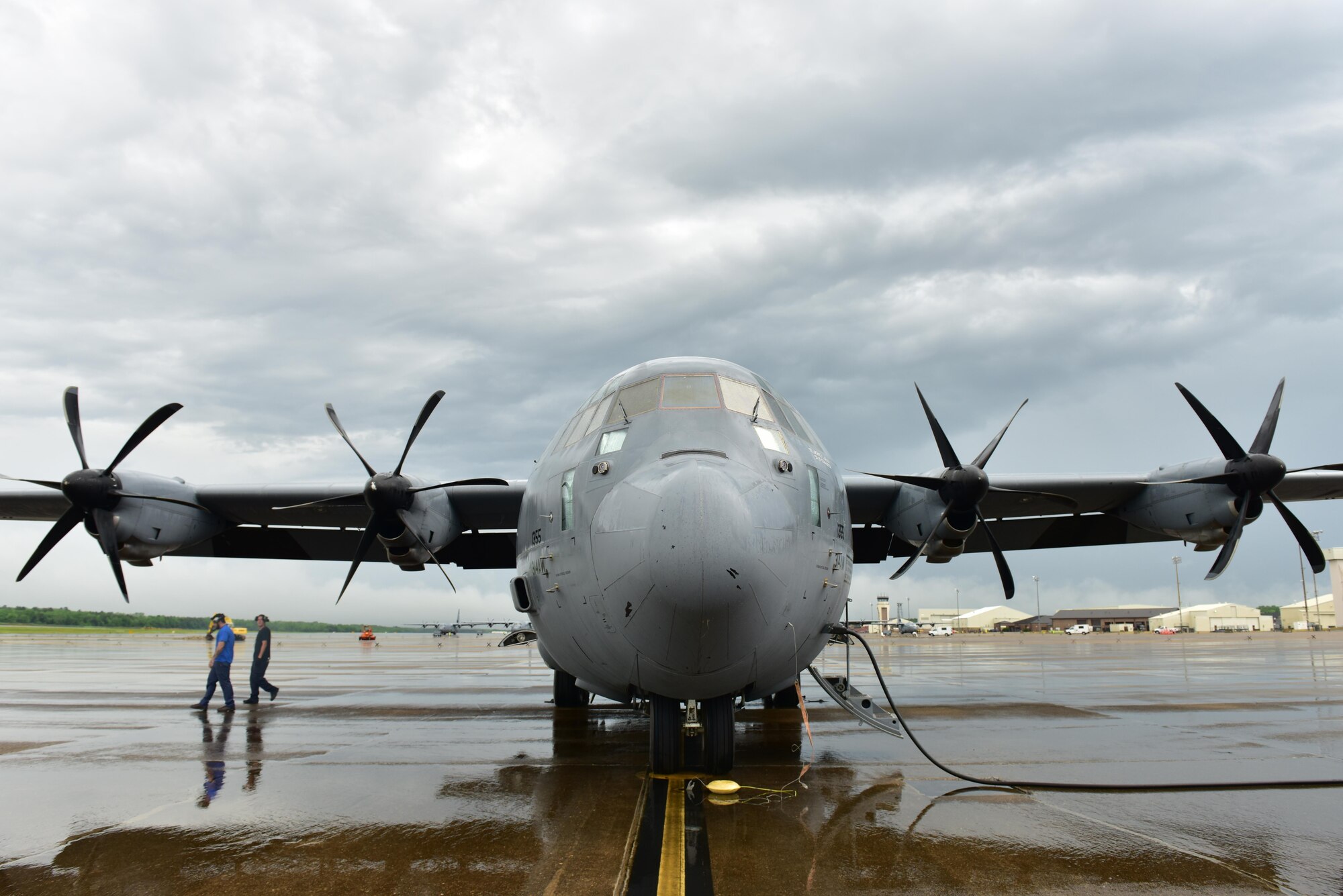 Members of DynCorp International prepare a C-130J for a flight April 17, 2017, at Little Rock Air Force Base, Ark. The 314th Maintenance Group transitioned from enlisted maintainers to DynCorp International contractors to sustain the C-130 training mission. (U.S. Air Force photo by Senior Airman Mercedes Taylor)