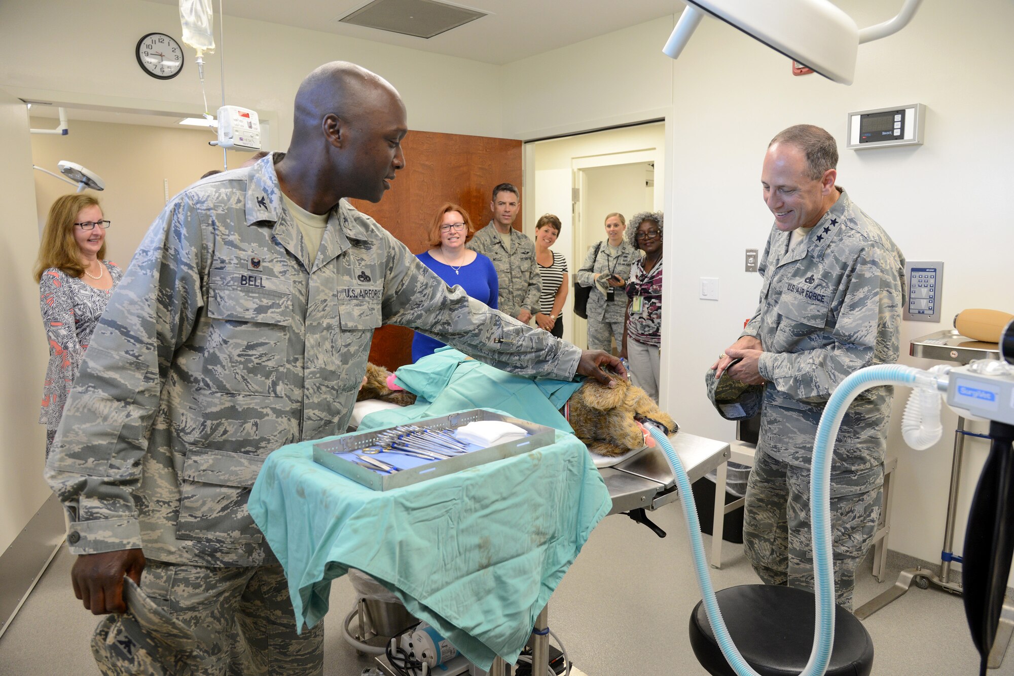 72nd Air Base Wing Commander Col. Kenyon Bell and Air Force Sustainment Center Commander Lt. Gen. Lee K. Levy II check out the surgery room in the new Veterinary Treatment Facility, where the clinic’s CPR training dog provides a realistic interpretation of an actual surgery set-up. A ribbon cutting ceremony was held July 17 to officially open the new clinic, whose services are available to Active Duty, Reserve, Guard, retirees and dependents. (Air Force photo by Kelly White)