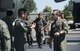 Capt. Mark Bishop, KC-10 Extender aircraft commander and international relations team member, greets members from the 251 Squadron, 5th Air Mobility Wing, Gimhae Airbase, Busan, Republic of Korea, following their arrival to Mobility Guardian, Joint Base Lewis-McChord, Wash., July 29, 2017. Crew members from 251 Squadron, 5th Fighter Wing, Gimhae Air Base, Busan, South Korea, wait to secure their aircraft propellers following their arrival to Mobility Guardian, Joint Base Lewis-McChord, July 9, 2017. More than 3,000 Airmen, Soldiers, Sailors, Marines and international partners converged on the state of Washington in support of Mobility Guardian. The exercise is intended to test the abilities of the Mobility Air Forces to execute rapid global mobility missions in dynamic, contested environments. Mobility Guardian is Air Mobility Command's premier exercise, providing an opportunity for the Mobility Air Forces to train with joint and international partners in airlift, air refueling, aeromedical evacuation and mobility support. Capt. Bishop is currently stationed at Joint Base McGuire-Dix-Lakehrust, N.J., and hails fom Grand Rapids, M.I. (U.S. Air Force photo by Senior Airman Lauren Russell)