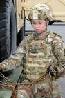 Spc. Felicia Weinsinger poses as Cpl. Weinsinger July 25 during a photoshoot at the U.S. Army Reserve’s Equipment Concentration Site 27.  Weinsinger was one of six Soldiers who were recently flown into Joint Base McGuire-Dix-Lakehurst, New Jersey for a photoshoot with Army Reserve Communications, Army Marketing and Research Group and United States Army Recruiting Command.  She’ll be featured on upcoming commercials and posters.  She is currently assigned to the 412th Theater Engineer Command.