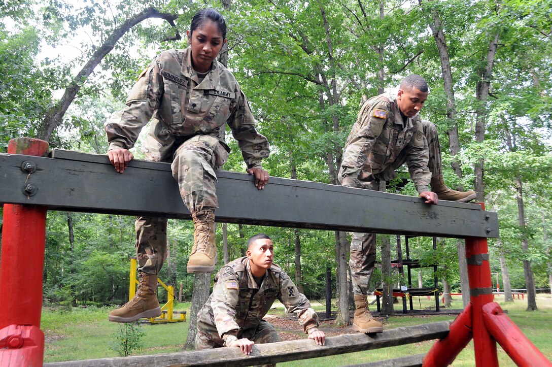 Army Reserve Soldiers are photographed July 27 on the obstacle course at Joint Base McGuire-Dix-Lakehurst, New Jersey.  The Soldiers were recently flown into JBMDL for a photoshoot with Army Reserve Communications, Army Marketing and Research Group and United States Army Recruiting Command.  They’ll be featured on upcoming commercials and posters.