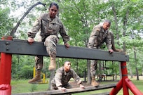Army Reserve Soldiers are photographed July 27 on the obstacle course at Joint Base McGuire-Dix-Lakehurst, New Jersey.  The Soldiers were recently flown into JBMDL for a photoshoot with Army Reserve Communications, Army Marketing and Research Group and United States Army Recruiting Command.  They’ll be featured on upcoming commercials and posters.