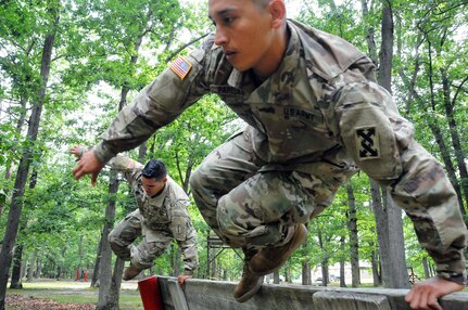 Sgt. Andrew Paredes (front) and Sgt. Ian Rivera-Aponteare photographed July 27 on the obstacle course at Joint Base McGuire-Dix-Lakehurst, New Jersey.  The Soldiers were recently flown into JBMDL for a photoshoot with Army Reserve Communications, Army Marketing and Research Group and United States Army Recruiting Command.  They’ll be featured on upcoming commercials and posters.