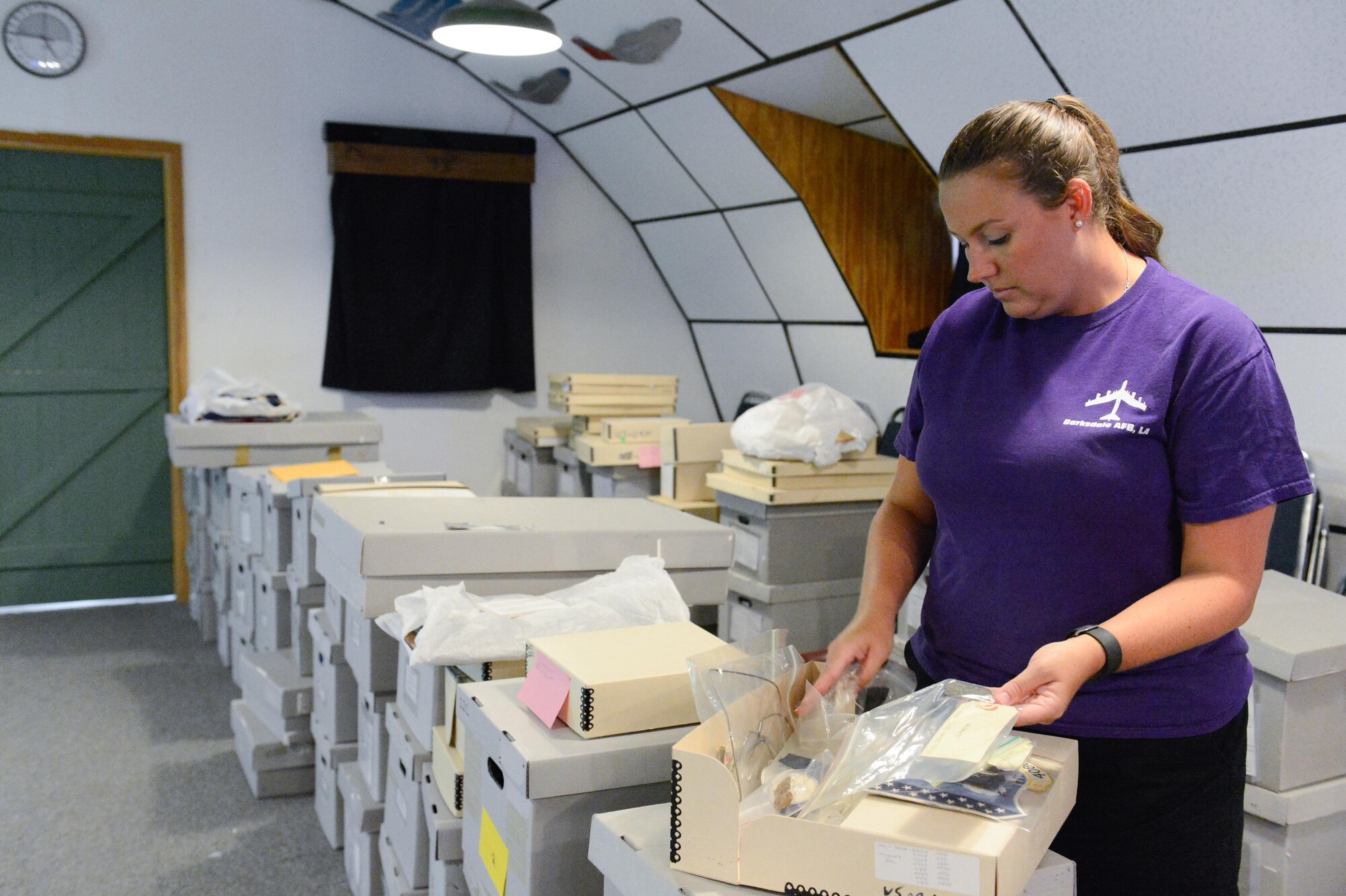 Amy Russell looks through archives at the Barksdale Global Power Museum on Barksdale Air Force Base, La., July 12, 2017. The archives holds valuable artifacts such as the personal, handwritten journal of Eugene “Hoy” Barksdale, the namesake of the base.