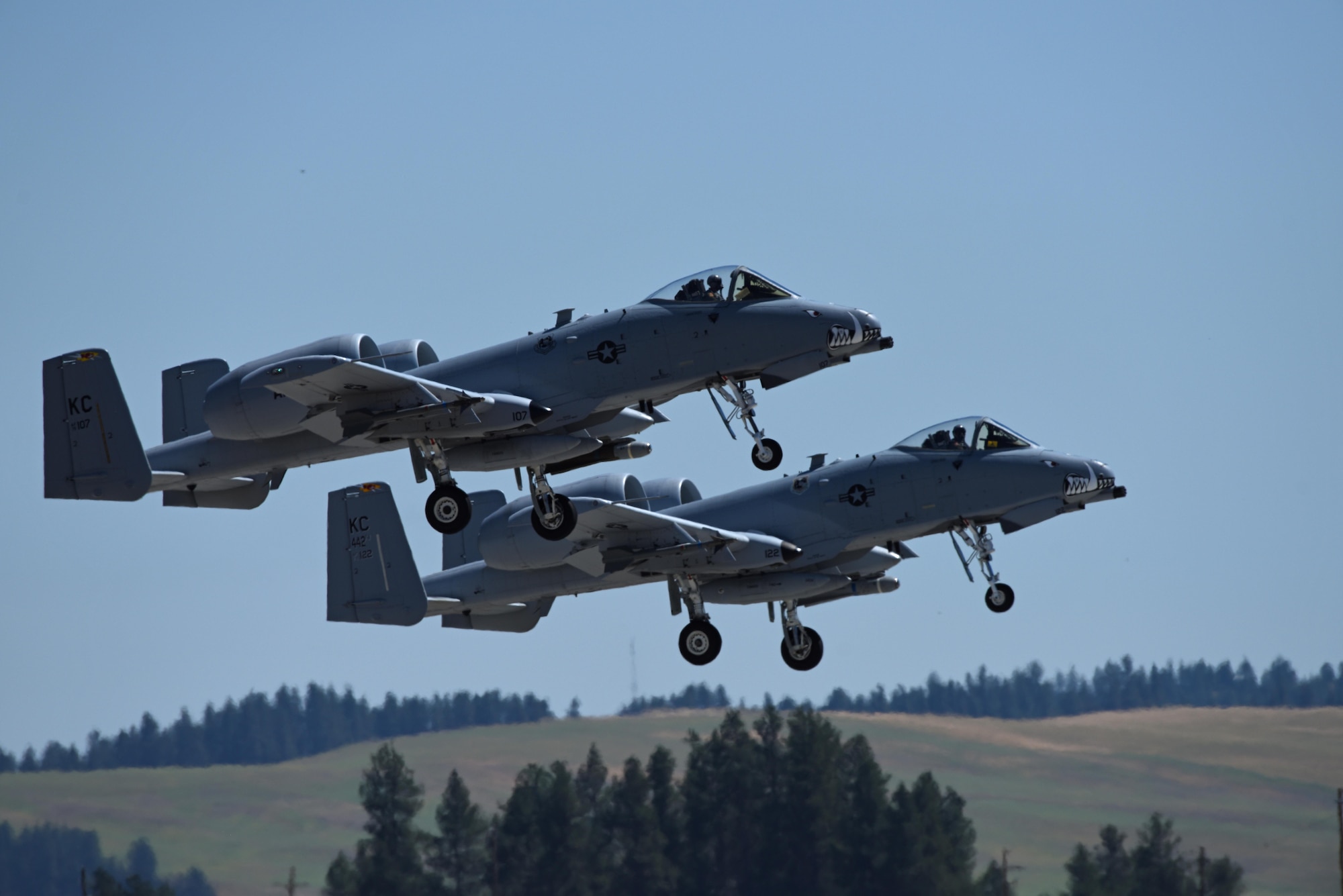 Two A-10 Thunderbolt II aircraft perform during the 2017 Skyfest Air Show and Open House July 29, 2017, at Fairchild Air Force Base, Washington. The A-10 has excellent maneuverability at low air speeds and altitude, and is a highly accurate and survivable weapons-delivery platform. (U.S. Air Force photo/Airman 1st Class Jesenia Landaverde)
