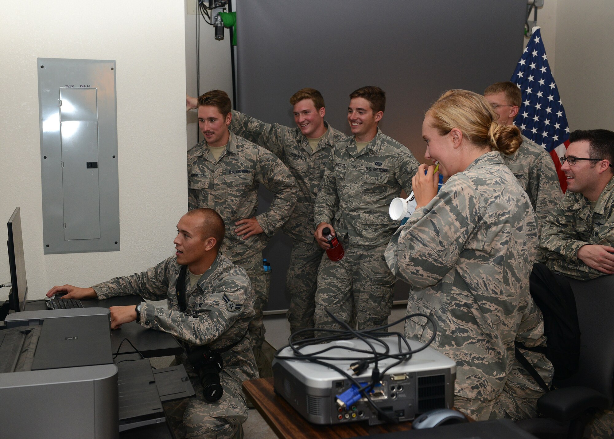 Airman 1st Class Caleb Worpel, 56th Fighter Wing photojournalist, shows the U.S. Air Force Academy cadets the studio editing process during their tour July 31, 2017 at Luke Air Force Base, Ariz. The purpose of the tour was to allow the cadets to shadow officers and enlisted and increase their understanding of what it will be like as a junior officer in the United States Air Force. (U.S. Air Force photo by Senior Airman Devante Williams)  