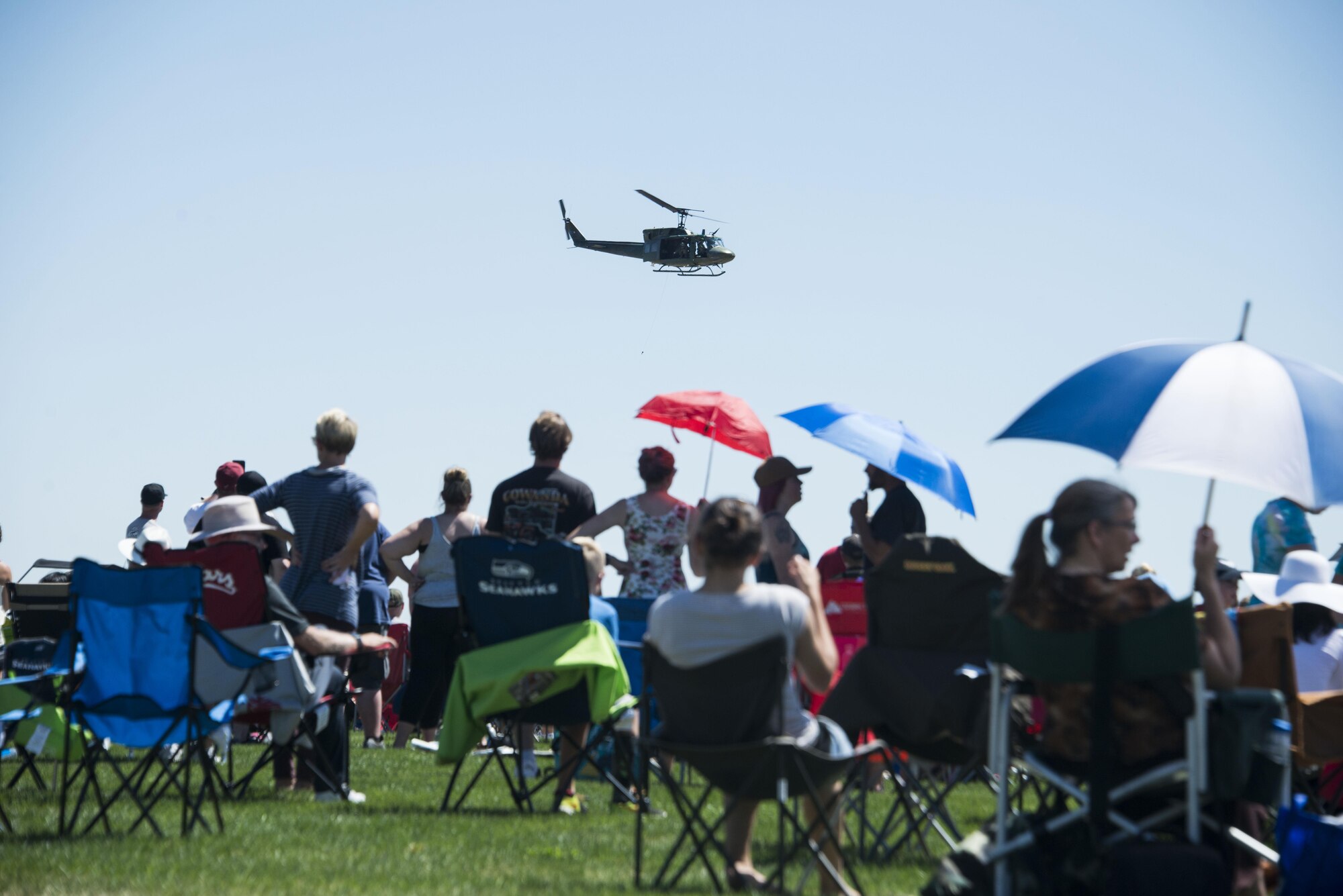 A UH-1N Huey performs during the Skyfest 2017 Air Show and Open House at Fairchild Air Force Base, Washington, July 29, 2017. SkyFest was an opportunity to give the local and regional community a chance to view Airmen and our resources. (U.S. Air Force photo/Senior Airman Janelle Patiño)