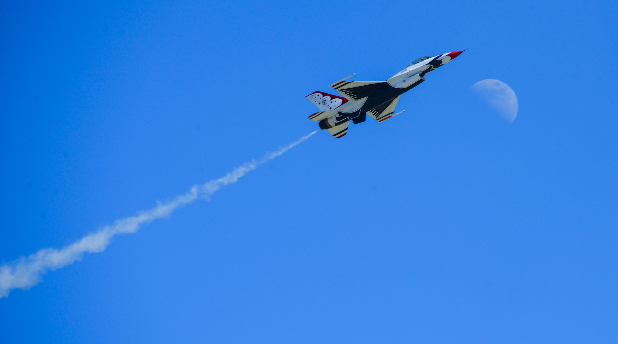 One of The U.S. Air Force Aerial Demonstration Squadron “Thunderbirds” flies in formation during SkyFest 2017 Air Show and Open House at Fairchild Air Force Base, Washington, July 30, 2017. SkyFest is Fairchild’s air show and open house to give the local and regional community the opportunity to meet Airmen and learn about the Air Force mission. (U.S. Air Force photo/Senior Airman Janelle Patiño)