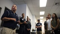 Master Sgt. Israel Del Toro, unit, position, speaks at the local Spokane U.S. Air Force recruiting office July 28, 2017, Spokane, Washington. Del Toro is the first 100 percent combat disabled Air Force technician to re-enlist. (U.S. Air Force photo/ Senior Airman Sean Campbell)  