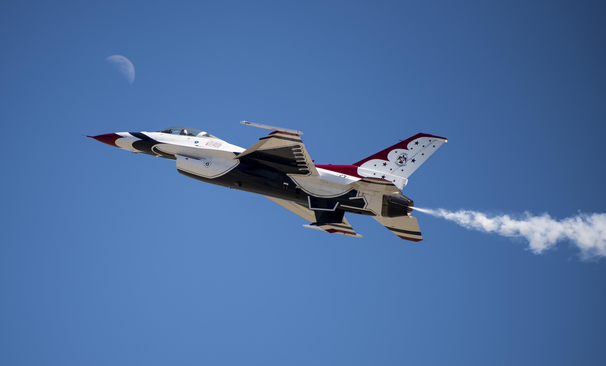 A U.S. Air Force Aerial Demonstration Squadron “Thunderbird” F-16 Fighting Falcon reaches for the moon July 29, 2017, at Fairchild Air Force Base, Washington.  The Thunderbirds switched from what? to the F-16A Fighting Falcon on June 22, 1982. (U.S. Air Force photo/ Senior Airman Sean Campbell)  