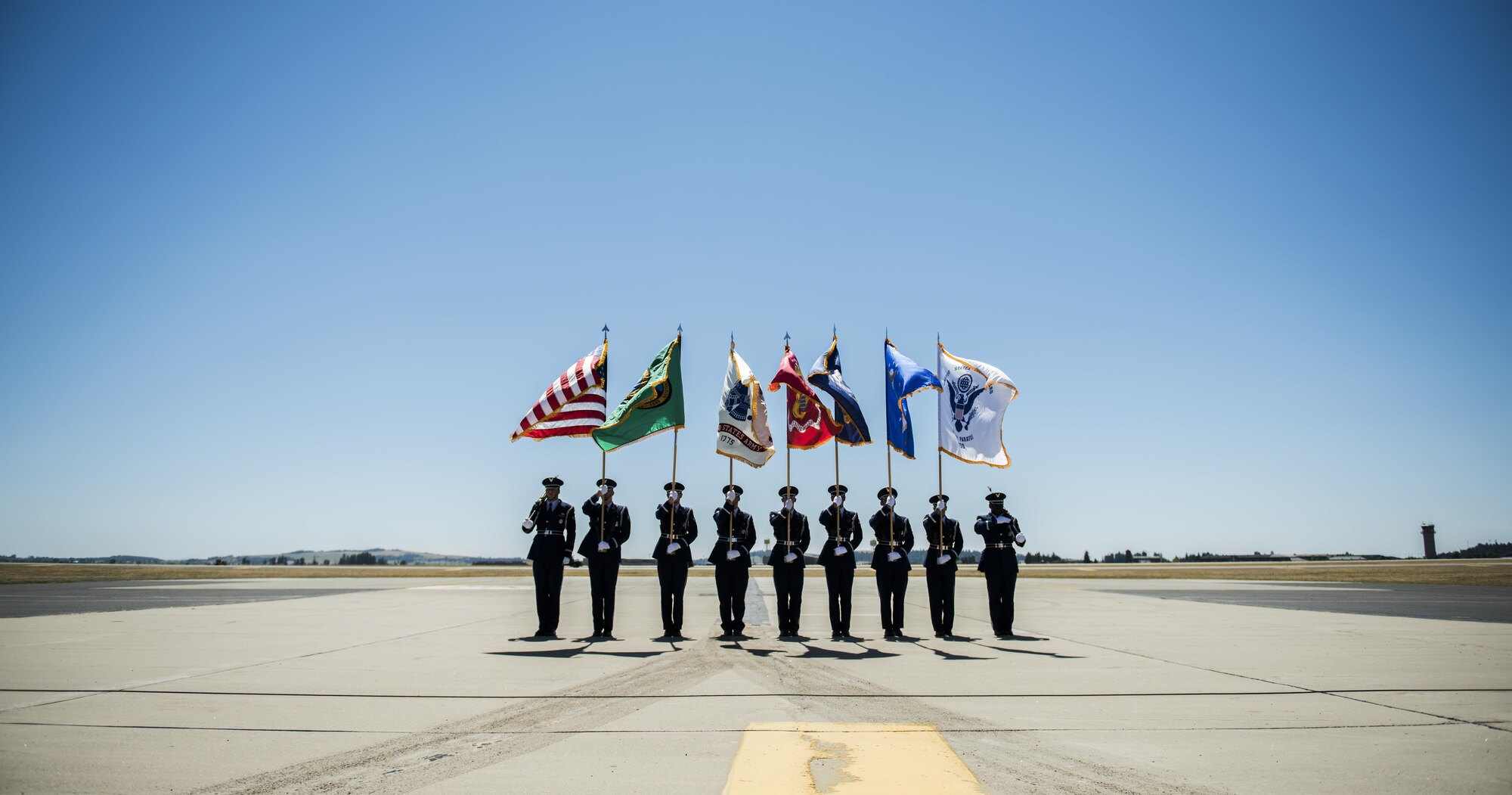 The Fairchild Air Force Base Honor Guard presents opening colors at Skyfest 2017 Air Show and Open House July 28, 2017, at Fairchild Air Force Base, Washington. Fairchild’s honor guardsmen perform numerous types of ceremonies, to include two-man and six-man flag folding sequences, colors presentation, colors posting and marching in parades. (U.S. Air Force photo/ Senior Airman Sean Campbell)  