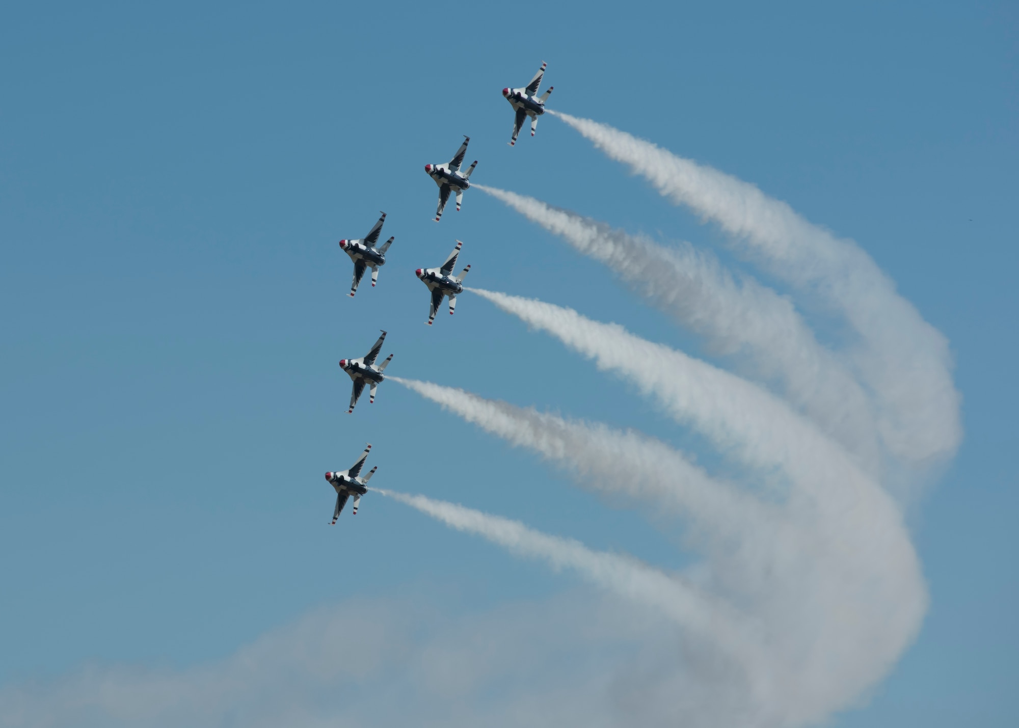 Six F-16 Fighting Falcons from the Thunderbirds aerial demonstration team fly in formation at the Skyfest 2017 air show and open house July 29, 2017, at Fairchild Air Force Base, Washington. The Thunderbirds are assigned to the 57th Wing, and are based at Nellis Air Force Base, Nevada. (U.S. Air Force photo / Airman 1st Class Ryan Lackey)