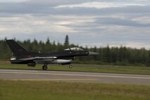 A U.S. Air Force F-16 Fighting Falcon aircraft assigned to the 18th Aggressor Squadron, takes off during RED FLAG-Alaska (RF-A) 17-3, July 31, 2017, at Eielson Air Force Base, Alaska. RF-A provides an optimal training environment in the Indo-Asia-Pacific Region and focuses on improving ground, space, and cyberspace combat readiness and interoperability for U.S. and international forces. (U.S. Air Force photo by Airman 1st Class Isaac Johnson)