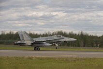 A Royal Canadian Air Force CF-18 Hornet fighter aircraft assigned to the 425th Tactical Fighter Squadron, Canadian Forces Base Bagotville, Canada, takes off during FLAG-Alaska (RF-A) 17-3, July 31, 2017, at Eielson Air Force Base, Alaska. RF-A provides an optimal training environment in the Indo-Asia Pacific Region and focuses on improving ground, space, and cyberspace combat readiness and interoperability for U.S. and international forces. (U.S. Air Force photo by Airman 1st Class Isaac Johnson)