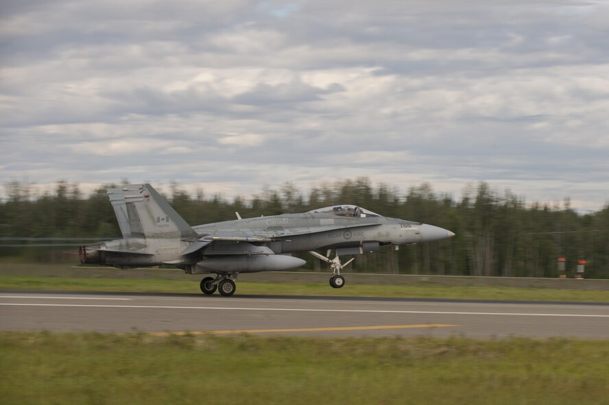 A Royal Canadian Air Force CF-18 Hornet fighter aircraft assigned to the 425th Tactical Fighter Squadron, Canadian Forces Base Bagotville, Canada, takes off during FLAG-Alaska (RF-A) 17-3, July 31, 2017, at Eielson Air Force Base, Alaska. RF-A provides an optimal training environment in the Indo-Asia Pacific Region and focuses on improving ground, space, and cyberspace combat readiness and interoperability for U.S. and international forces. (U.S. Air Force photo by Airman 1st Class Isaac Johnson)
