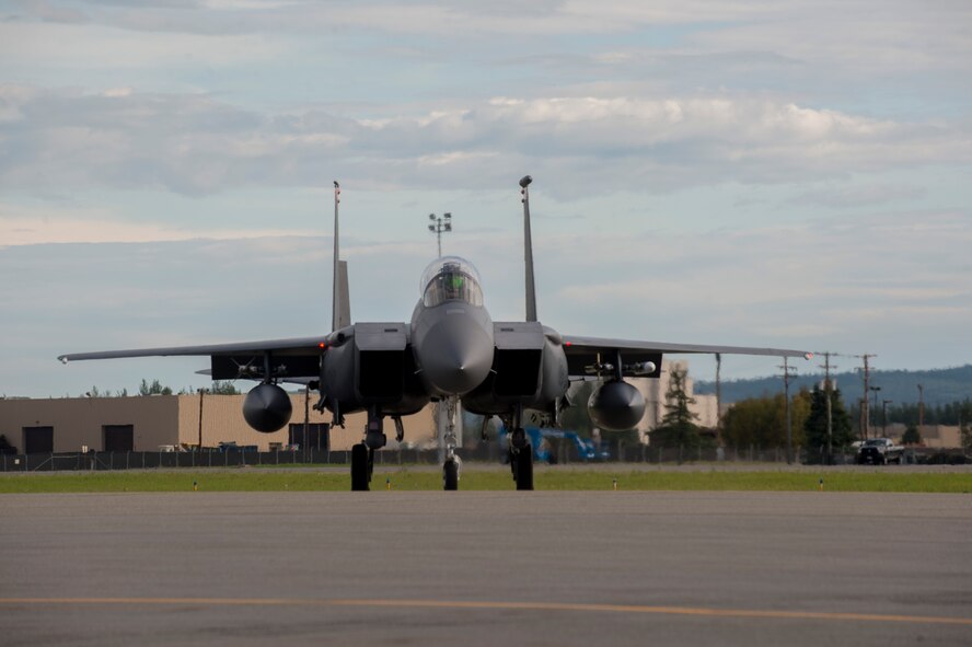 A U.S. Air Force F-15 Strike Eagle fighter aircraft, assigned to the 391st Fighter Squadron, Mountain Home Air Force Base (AFB), Idaho, prepares to take off during FLAG-Alaska (RF-A) 17-3, July 31, 2017, at Eielson AFB, Alaska. RF-A provides an optimal training environment in the Indo-Asia Pacific Region and focuses on improving ground, space, and cyberspace combat readiness and interoperability for U.S. and international forces. (U.S. Air Force photo by Airman 1st Class Isaac Johnson)