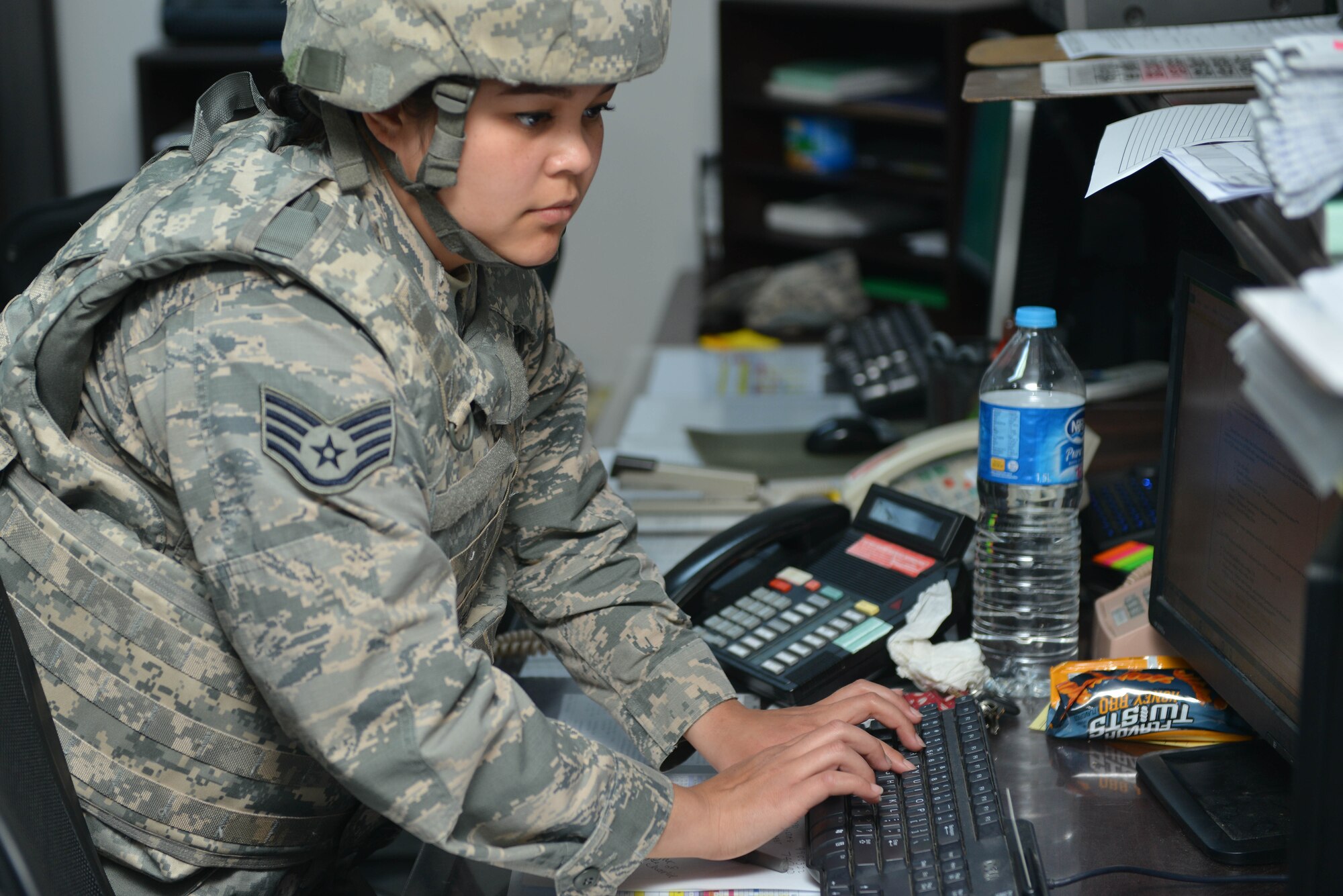 U.S. Air Force Staff Sgt. Trisha Dodds, 39th Operations Support Squadron airfield management operations supervisor, annotates information into an events log during an airfield indirect fire exercise, May 27, 2017, at Incirlik Air Base, Turkey. An events log contains general information pertaining to an event or situation. (U.S. Air Force photo by Senior Airman John Nieves Camacho)